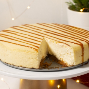 Eggnog Cheesecake with Spiced Butter Caramel Sauce
